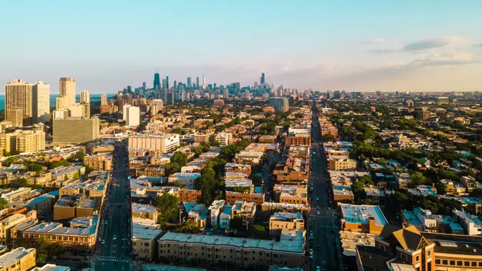 An aerial view of the buildings of Chicago in the evening.