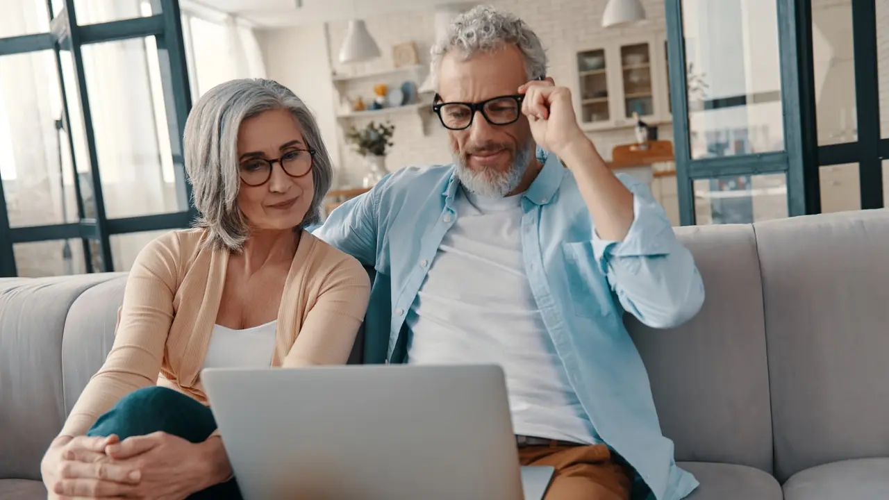 Modern senior couple in casual clothing stock photo