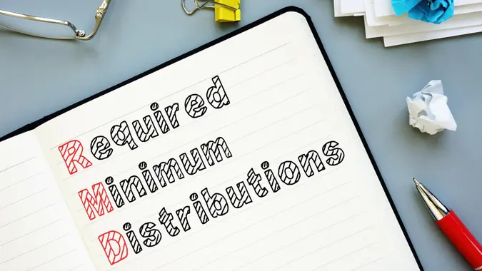 Required Minimum Distributions RMDs is shown on the conceptual business photo stock photo