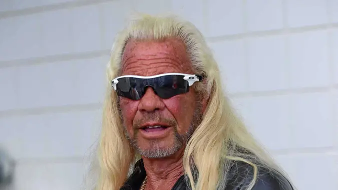 Mandatory Credit: Photo by Richard Shiro/AP/Shutterstock (10376972c)Dog the Bounty Hunter poses for a photo before the start of a NASCAR Cup Series auto race, at Darlington Raceway in Darlington, S.