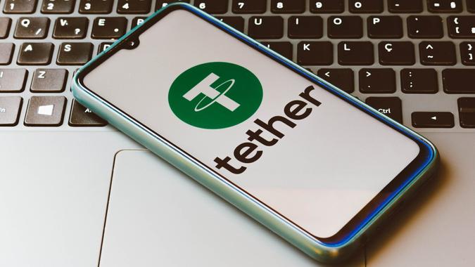 Mandatory Credit: Photo by Rafael Henrique/SOPA Images/Shutterstock (12363853o)In this photo illustration the Tether logo seen displayed on a smartphone.