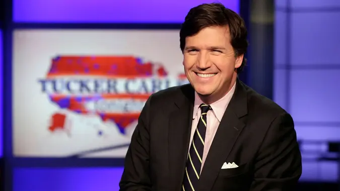 Mandatory Credit: Photo by AP/Shutterstock (8467748h)Tucker Carlson, host of "Tucker Carlson Tonight," poses for photos in a Fox News Channel studio, in New YorkTucker Carlson, New York, USA - 02 Mar 2017.