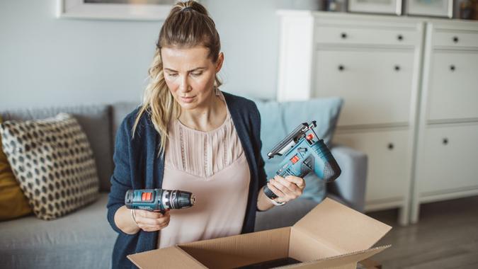 Unpacking tool delivery in pandemic situation stock photo