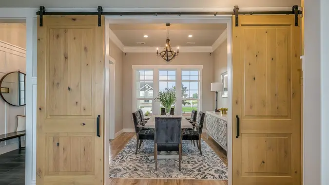 Beautiful wood barn doors and hardwood flooring give an elegant but down to earth type of feel.