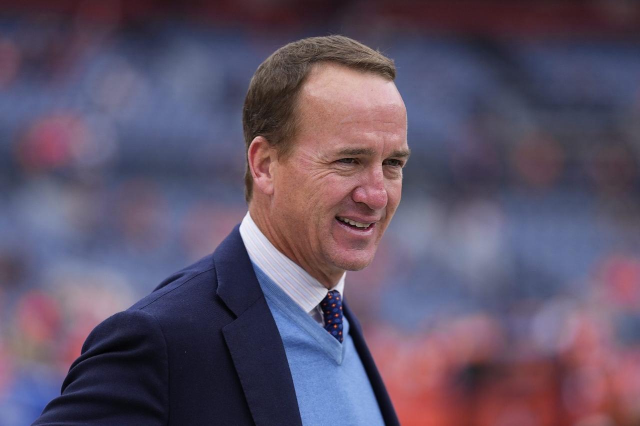 Mandatory Credit: Photo by Jack Dempsey/AP/Shutterstock (12584123x)Peyton Manning looks on from the sidelines prior to the start of an NFL football game between the Denver Broncos and the Washington Football Team, in DenverWashington Football, Denver, United States - 31 Oct 2021.