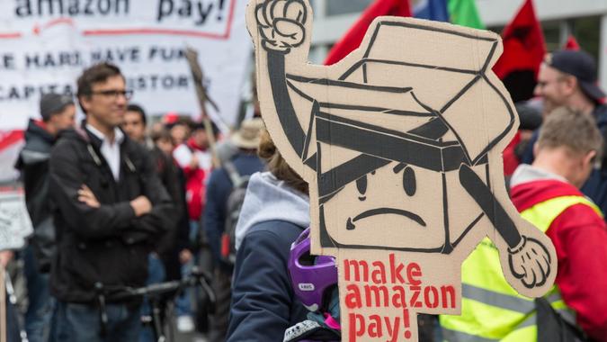 Make Amazon Pay: rally of employees against CEO Bezos, Berlin, Germany - 24 Apr 2018
