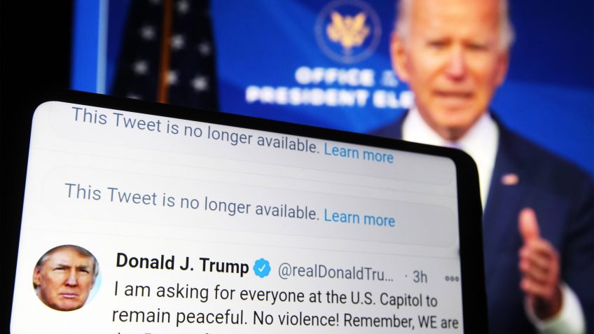 Mandatory Credit: Photo by Pavlo Gonchar/SOPA Images/Shutterstock (11695795d)In this photo illustration, Donald Trump Twitter messages are seen displayed on a smartphone screen in front of a fragment of a video with U.