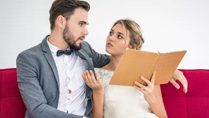 Couple Lover Helping choosing and looking at catalog album stock photo