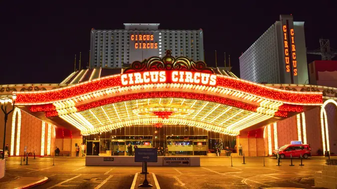 Photo of the illuminated Circus Circus Hotel & Casino Entrance in Las Vegas by night.