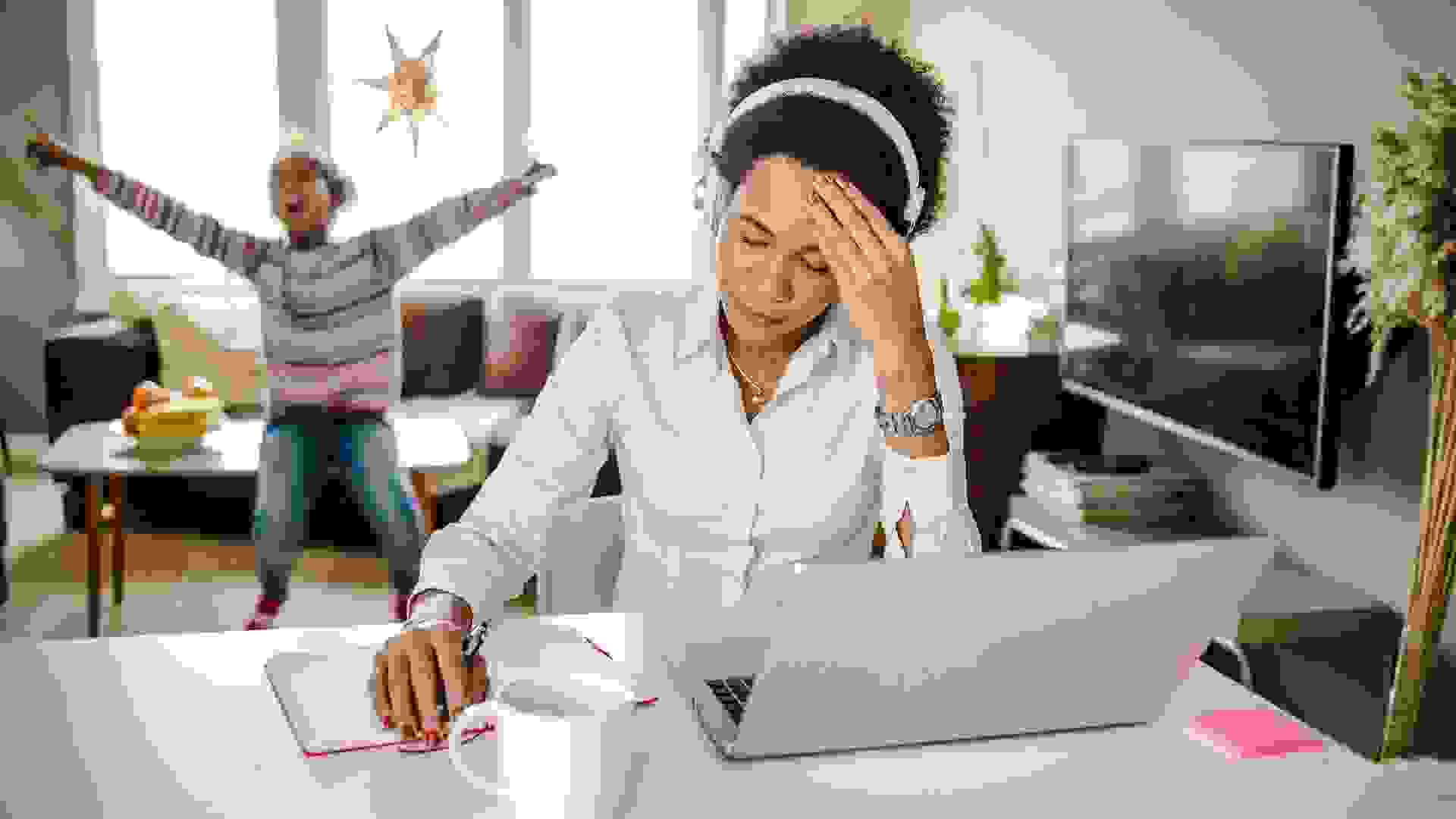 Working from home for a single mother can be stressful stock photo