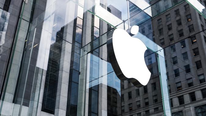 New York, United States - May 19, 2016: Glass building of the Apple Store with huge Apple Logo at 5th Avenue near Central Park.