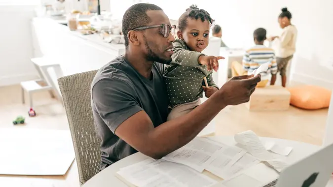 Dad working on taxes.