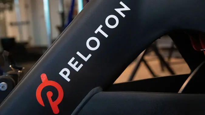 Mandatory Credit: Photo by Mark Lennihan/AP/Shutterstock (10424985g)The Peloton logo is displayed on the company's stationary bicycle, in New YorkFinancial Markets Wall Street Peloton IPO, New York, USA - 26 Sep 2019.