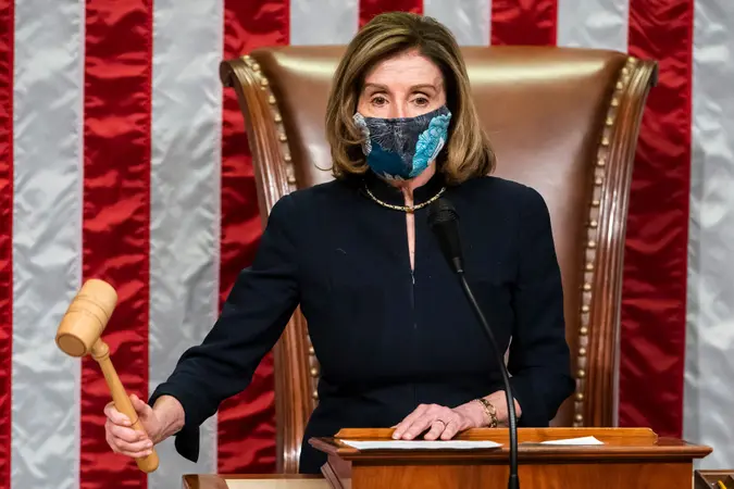 Mandatory Credit: Photo by JIM LO SCALZO/EPA-EFE/Shutterstock (11706185b)Speaker of the House Nancy Pelosi bangs the gavel after presiding over the House of Representatives as it voted to impeach Donald J.