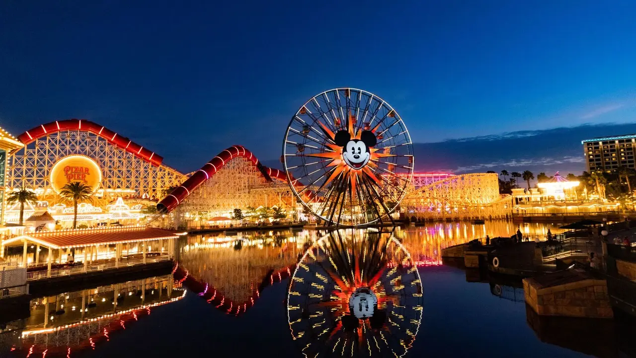 Mandatory Credit: Photo by Greg Chow/Shutterstock (12216945c)View of the Incredicoaster roller coaster and the Pixar Pal-A-Round at night in the Pixar Pier section of Disney California Adventure Park in AnaheimDisneyland in Anaheim, California, USA - 08 Jul 2021.