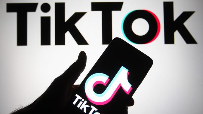 Mandatory Credit: Photo by Pavlo Gonchar/SOPA Images/Shutterstock (12601253k)In this photo illustration, TikTok logo is seen displayed on a smartphone screen and in the background.