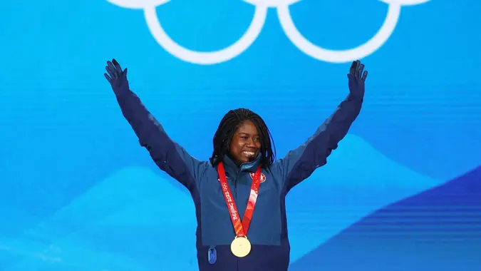 Mandatory Credit: Photo by JEROME FAVRE/EPA-EFE/Shutterstock (12804480g)Gold medalist Erin Jackson of the USA during the medal ceremony for the Women's Speed Skating 500m event at the Beijing 2022 Olympic Games, Beijing, China, 14 February 2022.