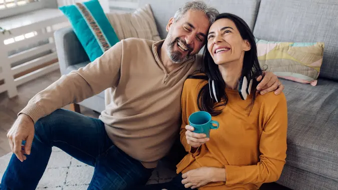 Mature couple taking a break from working and enjoying together stock photo