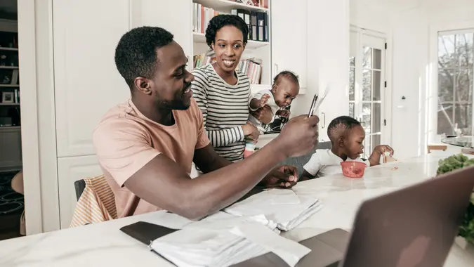 A couple is carefully studying their financial status.