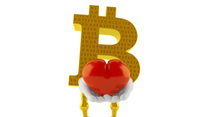 Bitcoin character holding heart isolated on white background.