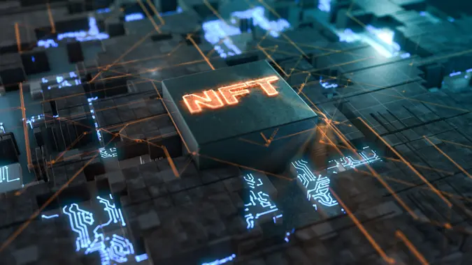 closeup of a futuristic electronic circuit with NFT text over cpu, concept of non-fungible token, crypto art and cryptocurrency mining (3d rendering).