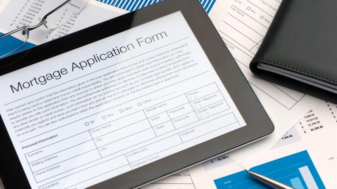 Online mortgage application form on a digital tablet.