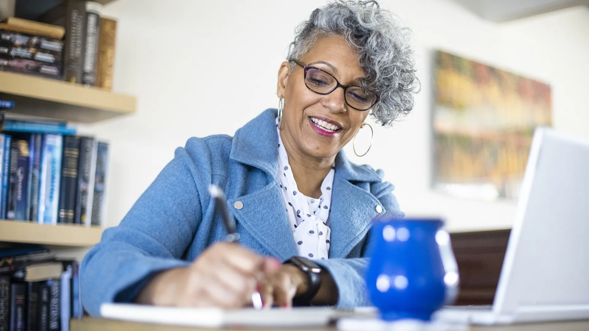 Mature Black Woman Working from Home stock photo
