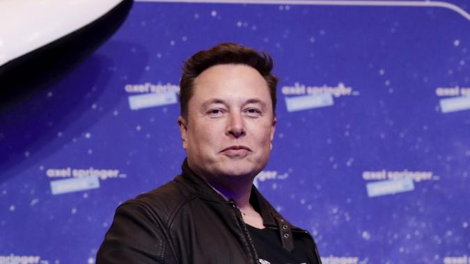 Mandatory Credit: Photo by Hannibal Hanschke/AP/Shutterstock (11088658g)SpaceX owner and Tesla CEO Elon Musk arrives on the red carpet for the Axel Springer media award, in Berlin, GermanyMusk, Berlin, Germany - 01 Dec 2020.