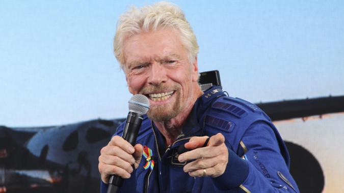 Mandatory Credit: Photo by Susan Montoya Bryan/AP/Shutterstock (12250031a)Richard Branson answers students' questions during a news conference at Spaceport America near Truth or Consequences, N.