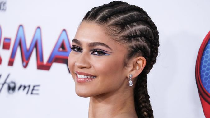 Mandatory Credit: Photo by Image Press Agency/NurPhoto/Shutterstock (12644167sw)Actress Zendaya Coleman wearing a Valentino dress, Bvlgari jewelry, and Christian Louboutin heels arrives at the Los Angeles Premiere Of Columbia Pictures' 'Spider-Man: No Way Home' held at the Regency Village Theatre on December 13, 2021 in Westwood, Los Angeles, California, United States.