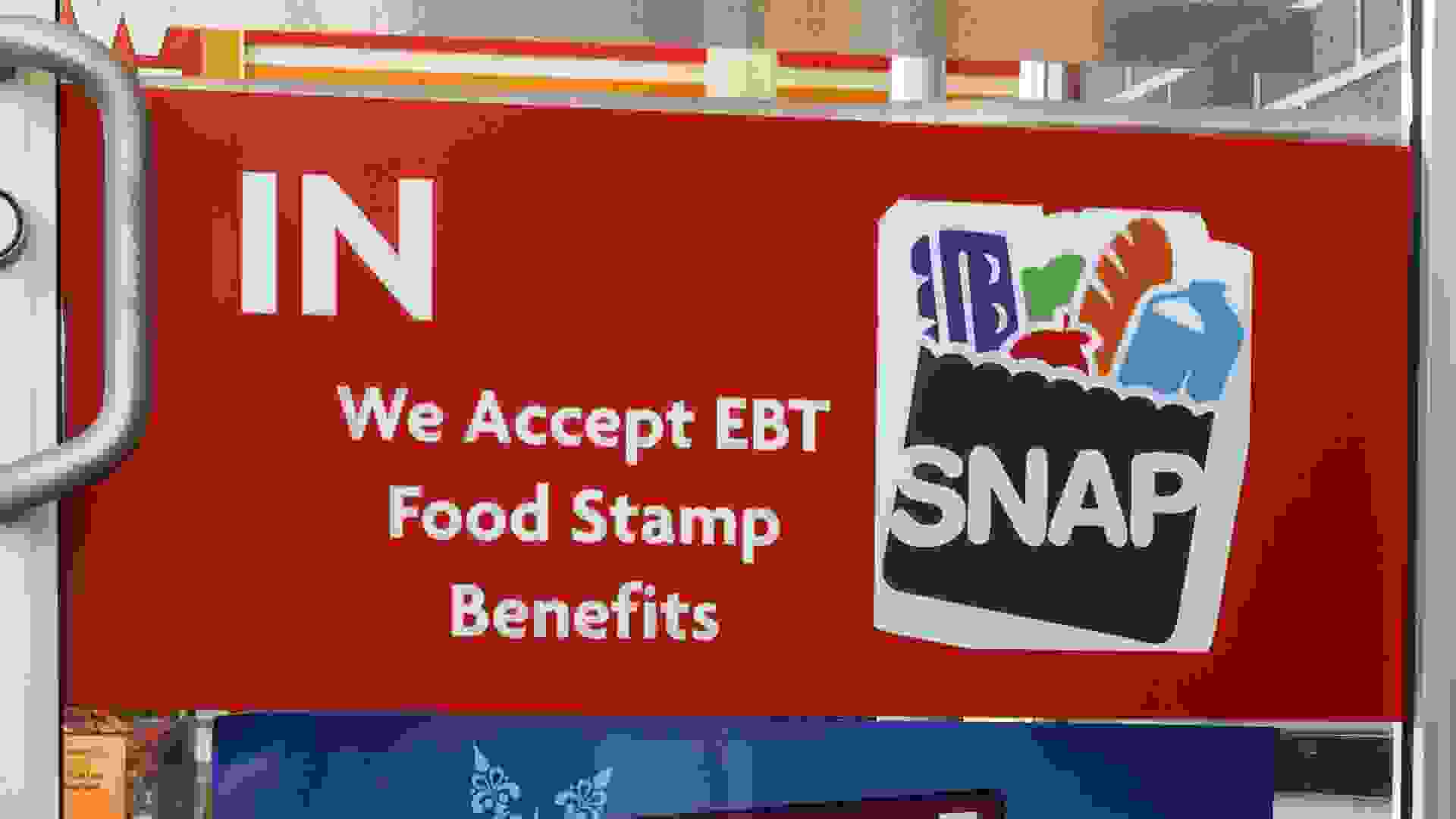 SNAP and EBT Accepted here sign. SNAP provides nutrition benefits to supplement the food budget of disadvantaged families stock photo