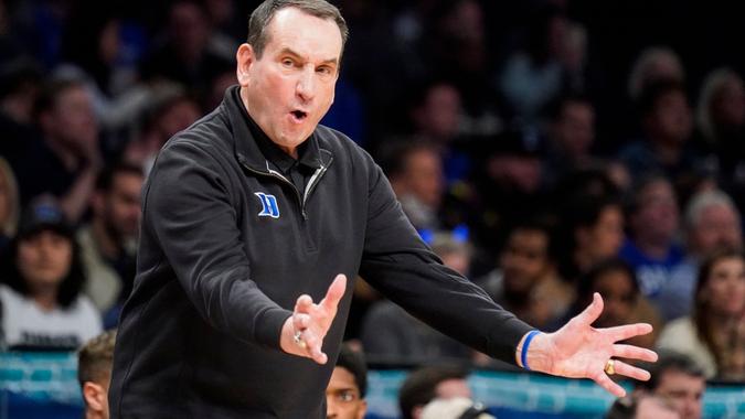 Mandatory Credit: Photo by John Minchillo/AP/Shutterstock (12847477b)Duke head coach Mike Krzyzewski works the bench in the second half of an NCAA college basketball championship game against Virginia Tech of the Atlantic Coast Conference men's tournament, in New York.