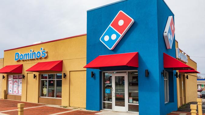 Hickory, NC, USA-2/28/19: A Domino's Pizza, also branded just as "Domino's", is an American pizza chain restaurant with headquarters in Ann Arbor, Michigan.