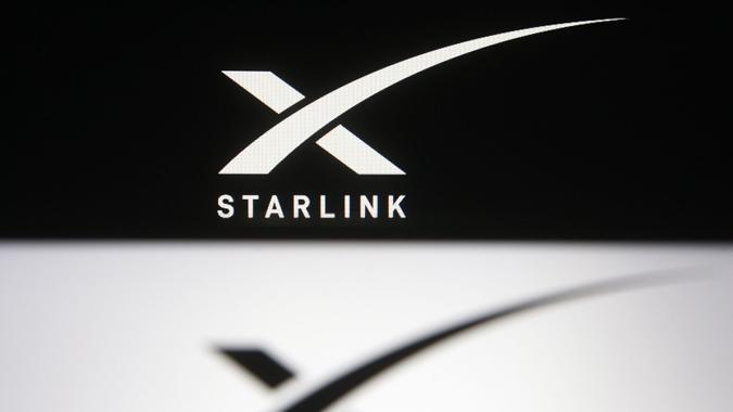 Mandatory Credit: Photo by Pavlo Gonchar/SOPA Images/Shutterstock (11770494i)In this photo illustration a Starlink logo of a satellite internet constellation being constructed by SpaceX is seen on a smartphone and a pc screen,Logos displayed on a smartphone in Ukraine - 21 Feb 2021.