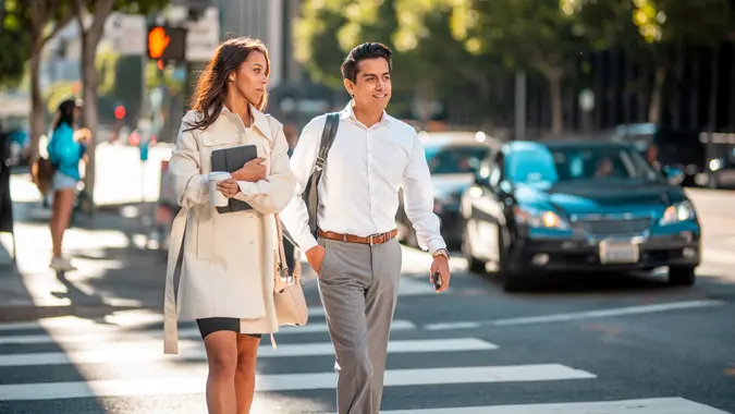 Latin Business Partners Crossing the Street in Los Angeles stock photo