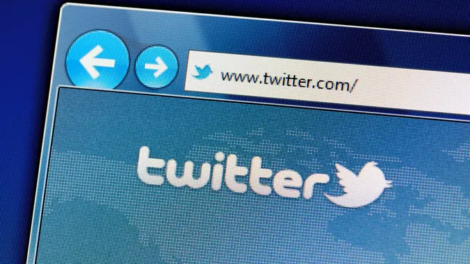 "Muenster, Germany - May 23, 2011: The twitter website is displayed in web browser on a computer screen.
