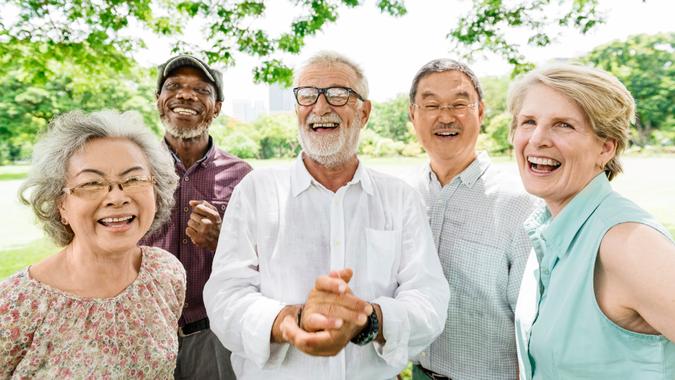 Group of Senior Retirement Friends Happiness Concept.