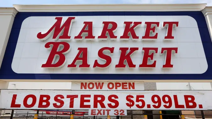 Mandatory Credit: Photo by Robert F Bukaty/AP/Shutterstock (10693032a)A sign advertises lobster prices at a Market Basket grocery store in Biddeford, Maine.