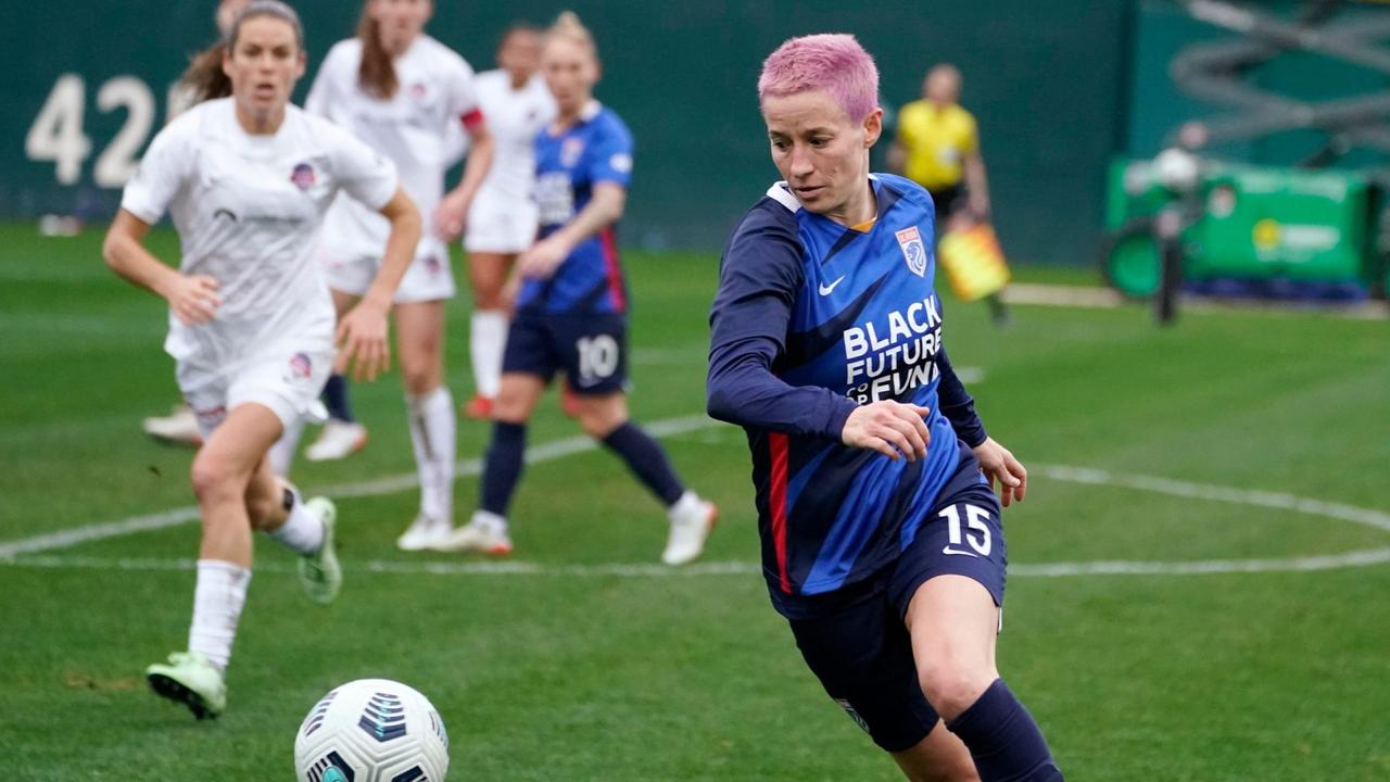 Mandatory Credit: Photo by Elaine Thompson/AP/Shutterstock (12602947f)Reign forward Megan Rapinoe (15) drives against the Washington Spirit in the second half in the semifinals of the NWSL soccer playoffs, in Tacoma, WashSpirit OL Reign Soccer, Tacoma, United States - 14 Nov 2021.