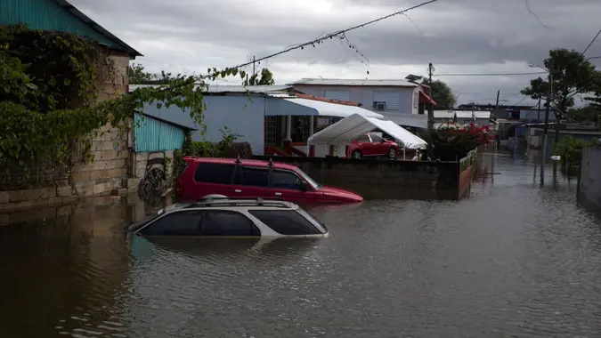 Mandatory Credit: Photo by THAIS LLORCA/EPA-EFE/Shutterstock (12793950w)Vehicles in the middle of a flooded street in Catano, Puerto Rico, 07 February 2022.