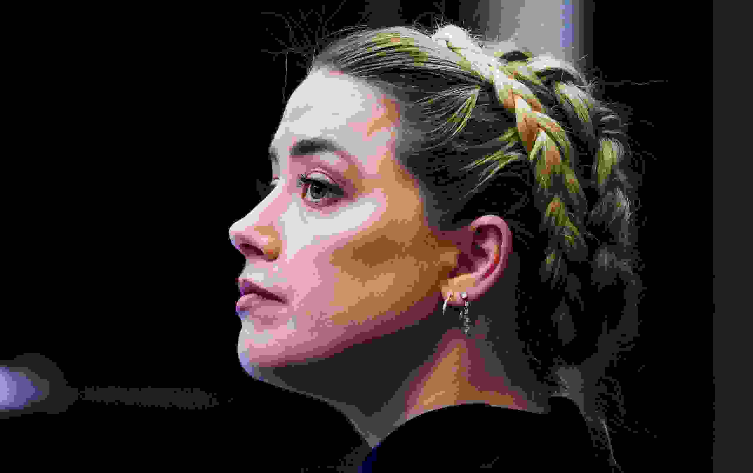 Mandatory Credit: Photo by Shawn Thew/AP/Shutterstock (12894677bb)Actress Amber Heard listens in court at the Fairfax County Circuit Courthouse in Fairfax, Va.