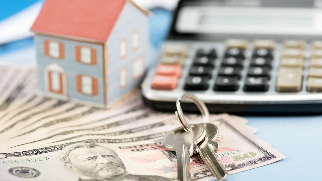 The concept of home ownership and 50 dollars high quality and high resolution studio shoot.