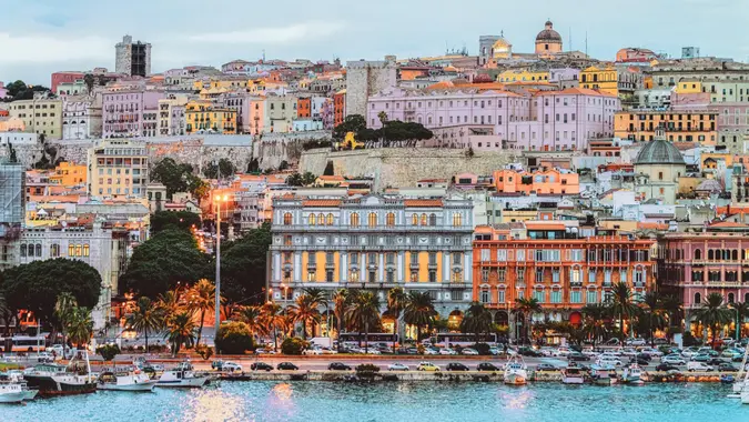 Cagliary cityscape and architecture with Mediterranean Sea in Sardinia island, Summer Italy.