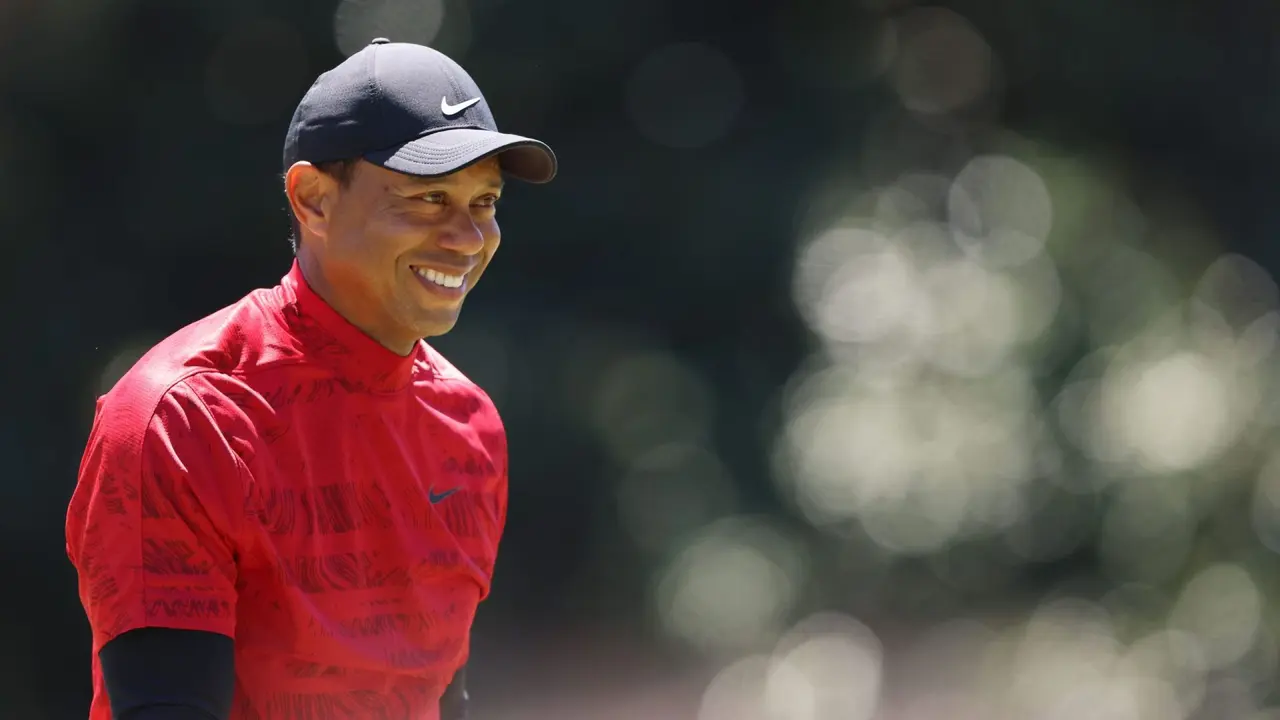 Mandatory Credit: Photo by JUSTIN LANE/Shutterstock (12890172r)Tiger Woods of the US reacts to patrons after sinking his putt on the fourteenth hole during the final round of the 2022 Masters Tournament at the Augusta National Golf Club in Augusta, Georgia, USA, 10 April 2022.
