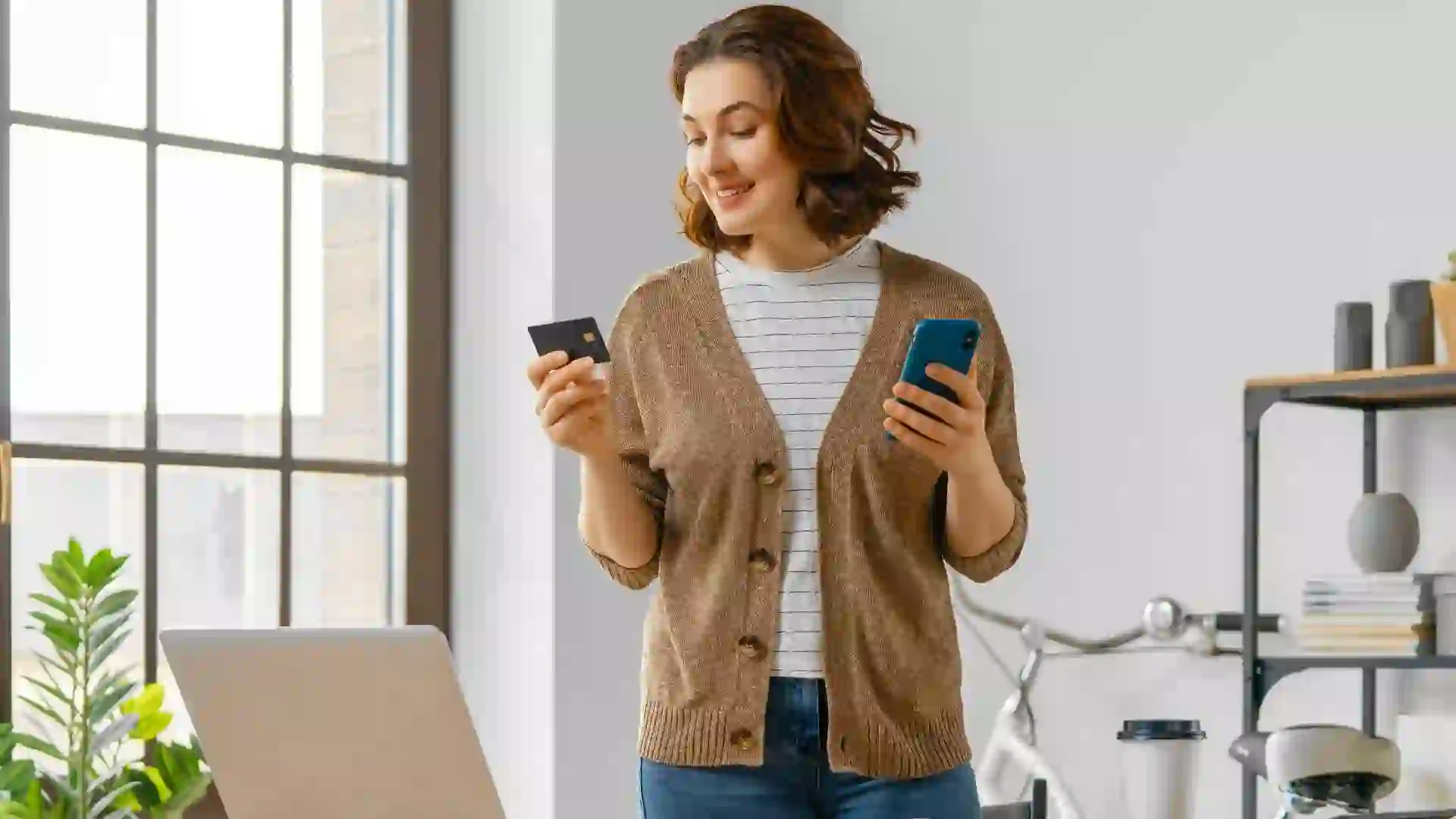Woman is doing online purchases stock photo