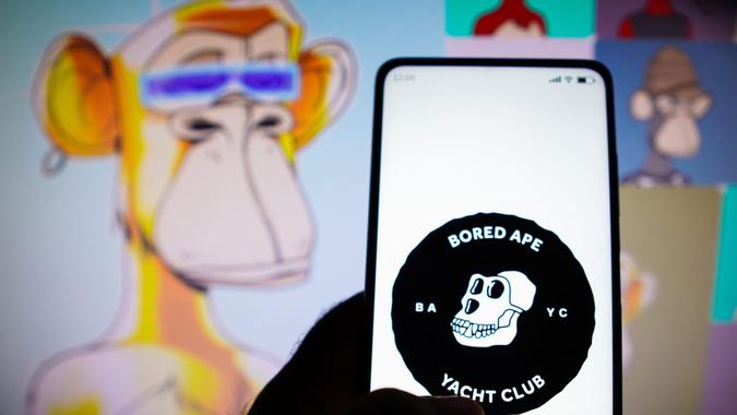 Mandatory Credit: Photo by Rafael Henrique/SOPA Images/Shutterstock (12929747l)In this photo illustration, the Bored Ape Yacht Club logo seen displayed on a smartphone.
