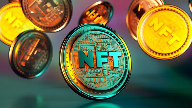 NFT non fungible token golden coins falling.