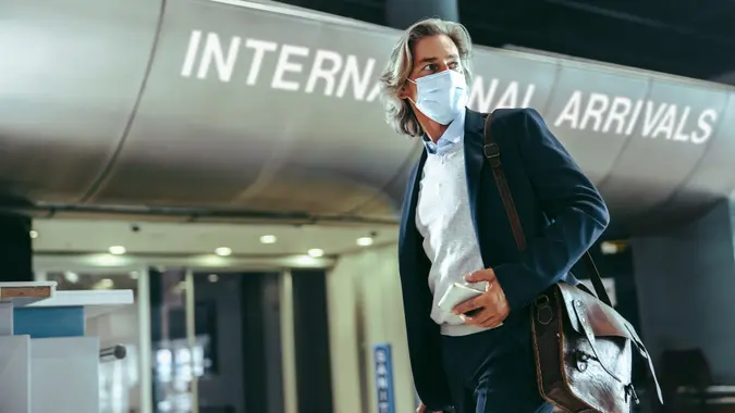 International business traveler at airport stock photo