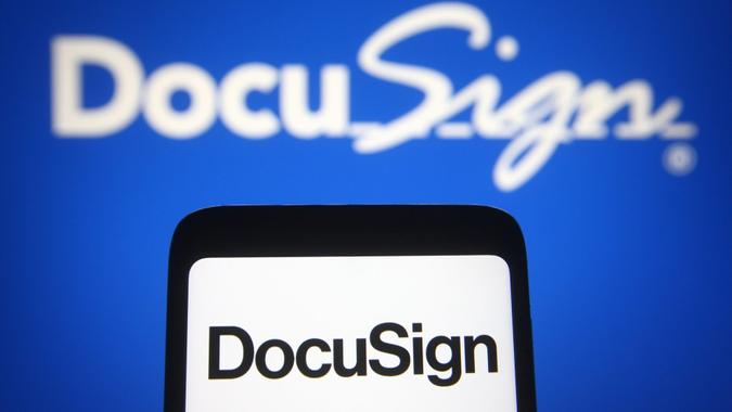 Mandatory Credit: Photo by Pavlo Gonchar/SOPA Images/Shutterstock (11844612l)In this photo illustration the DocuSign logo is seen on a smartphone and a pc screen.