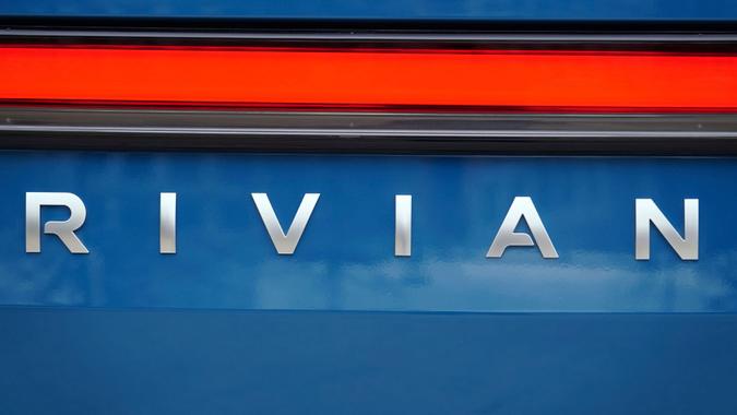 Mandatory Credit: Photo by John Bazemore/AP/Shutterstock (12649743a)Rivian logo is shown on one of the company's electric pickup trucks, in AtlantaRivian, Atlanta, United States - 15 Dec 2021.